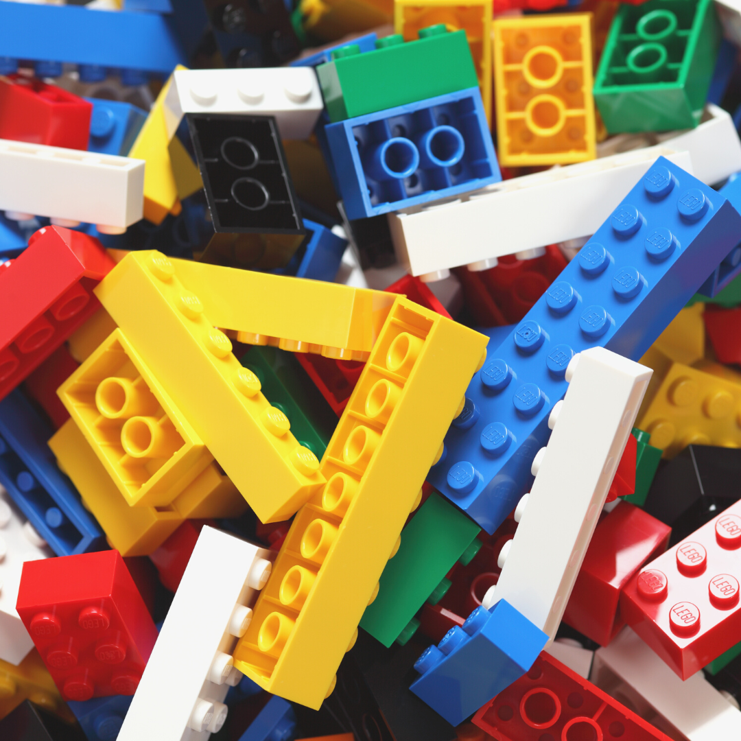Mix of legos, different sizes and colors all jumbled