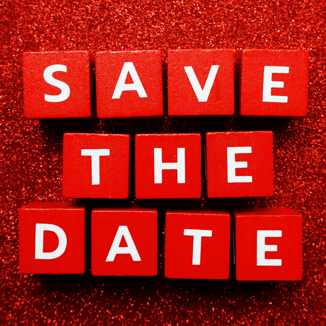 Save the date text on blocks atop a red sparkly background