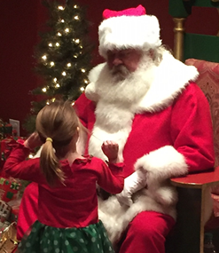 Santa Clause with little girl
