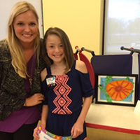 Student with her flower painting