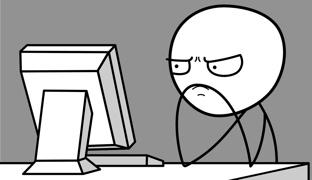 Black and white image of cartoon stick character staring angrily or determinedly at computer monitor