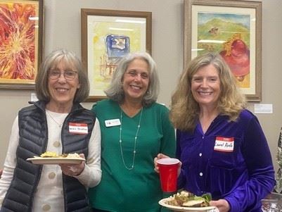 Photo of three FOTL members with refreshments